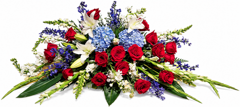 Arrangement funéraire avec roses rouges, lys blancs et fleurs bleue