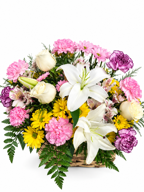 Panier floral composé de lys blancs, œillets roses et fleurs jaunes.