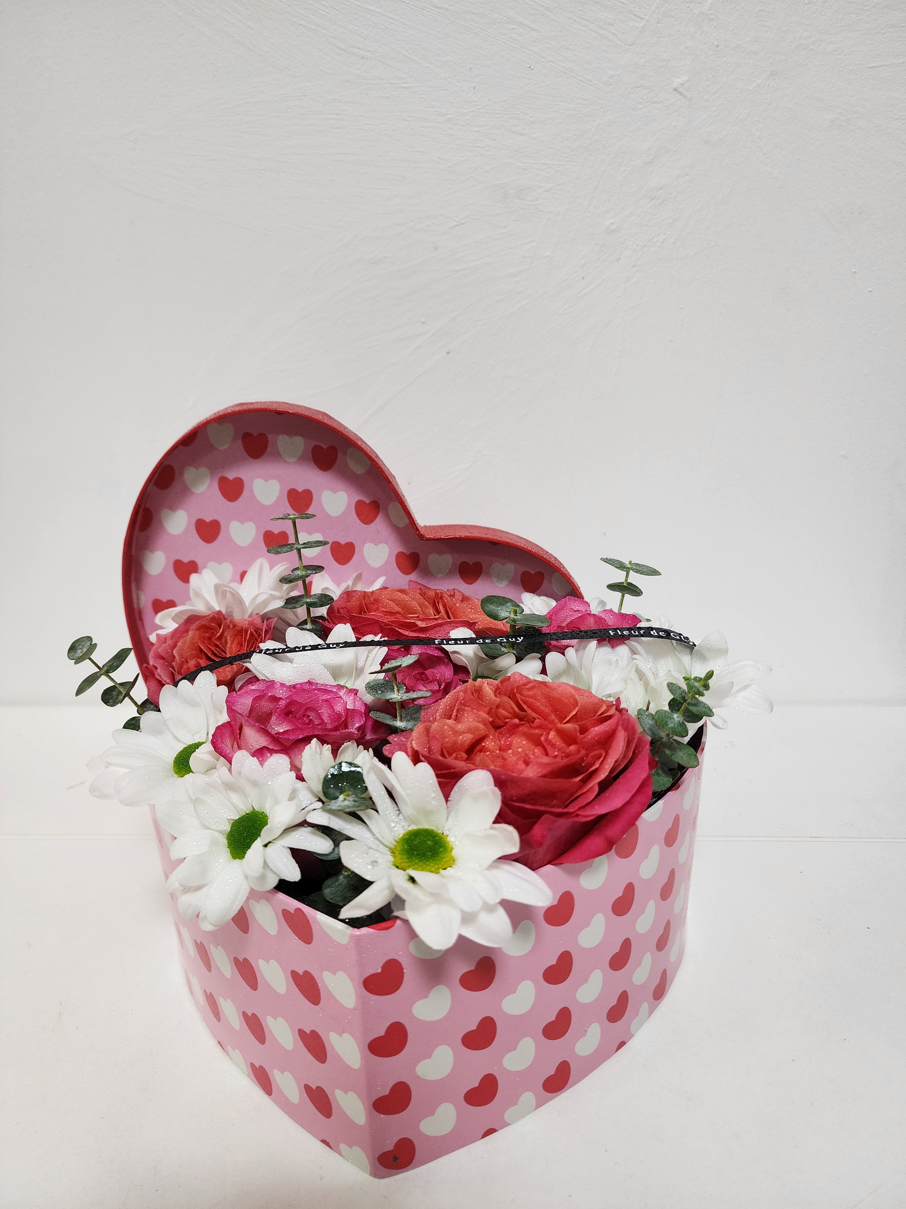 Fleurs dans une boîte de l'amour