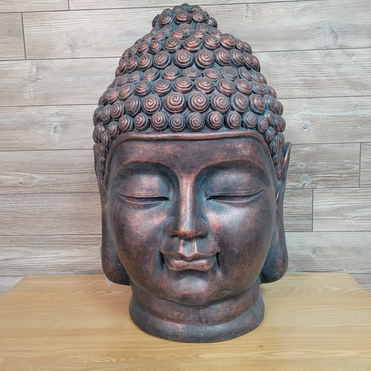 Tête de bouddha céramique